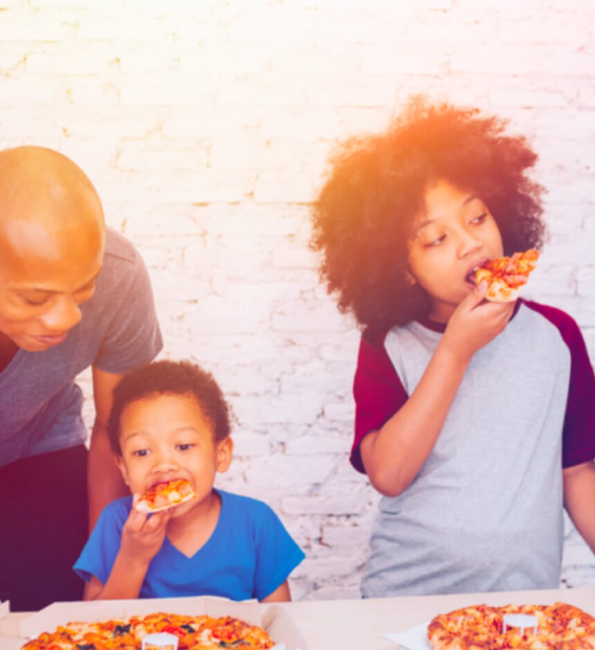 family eating pizza