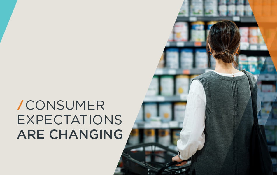 Woman at shelf in grocery store looking at products