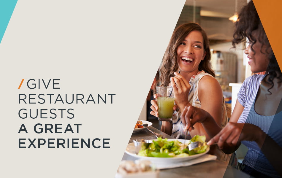 Two women enjoying a meal together at restaurant