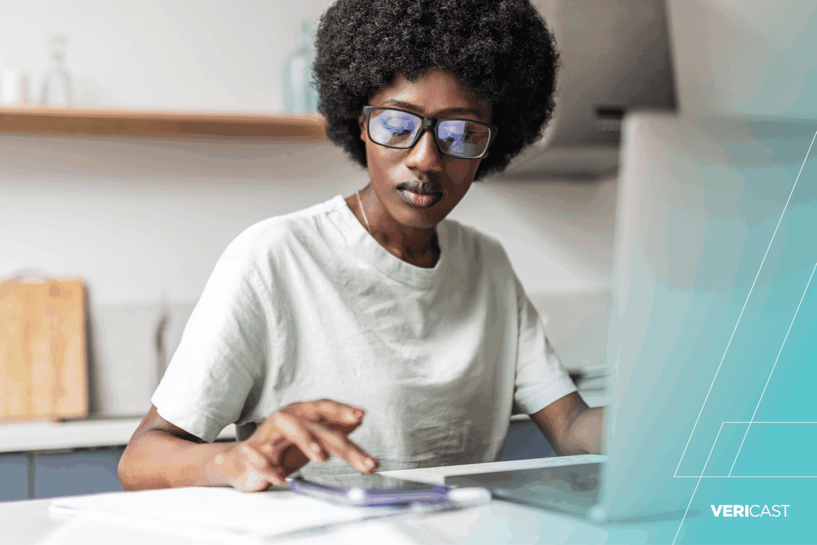 Woman prepares banking files for Fed rate change.